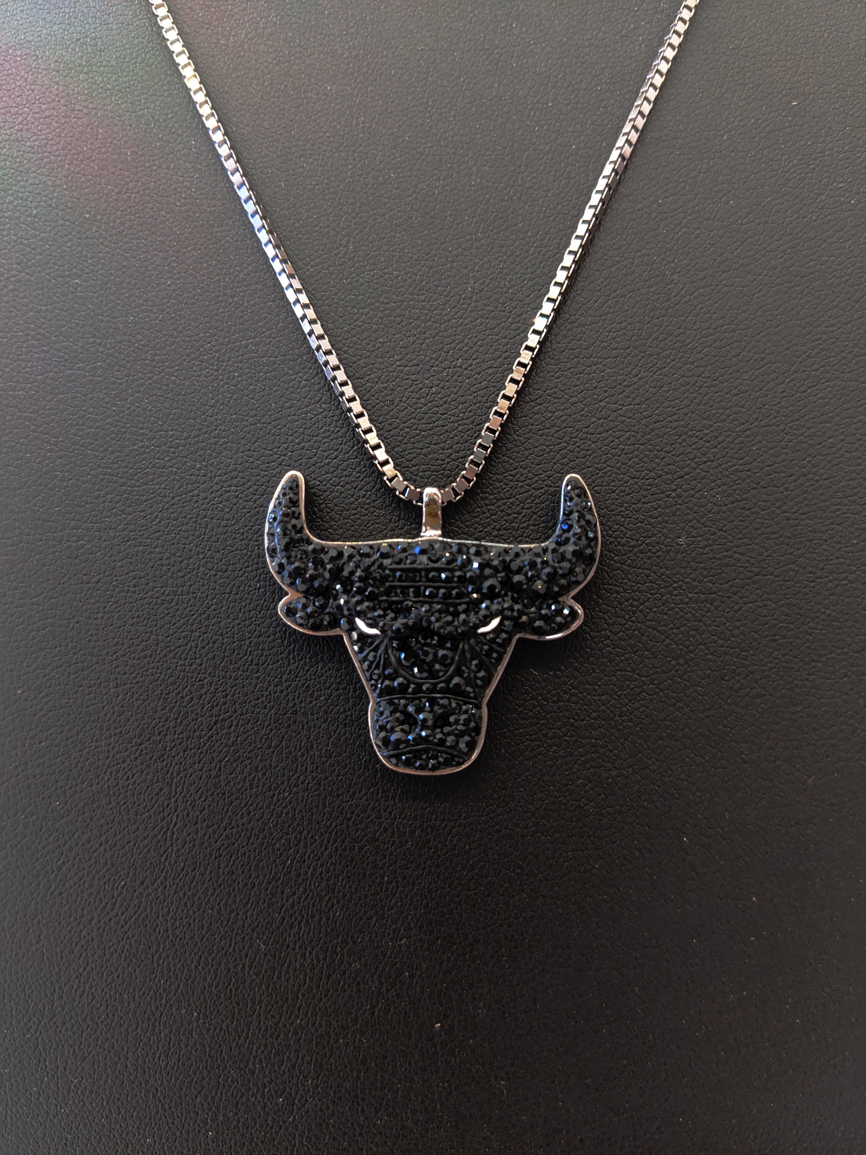 "Black Bulls Crystal Pendant" by Dan Life